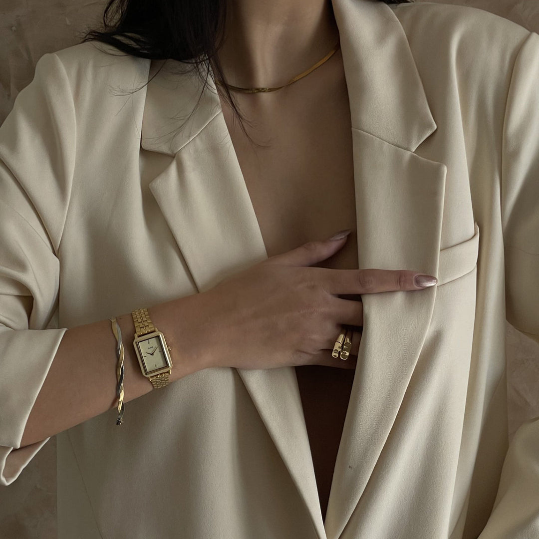 フリュエットウォッチ スチール、サンドテクスチャー フルゴールドカラー