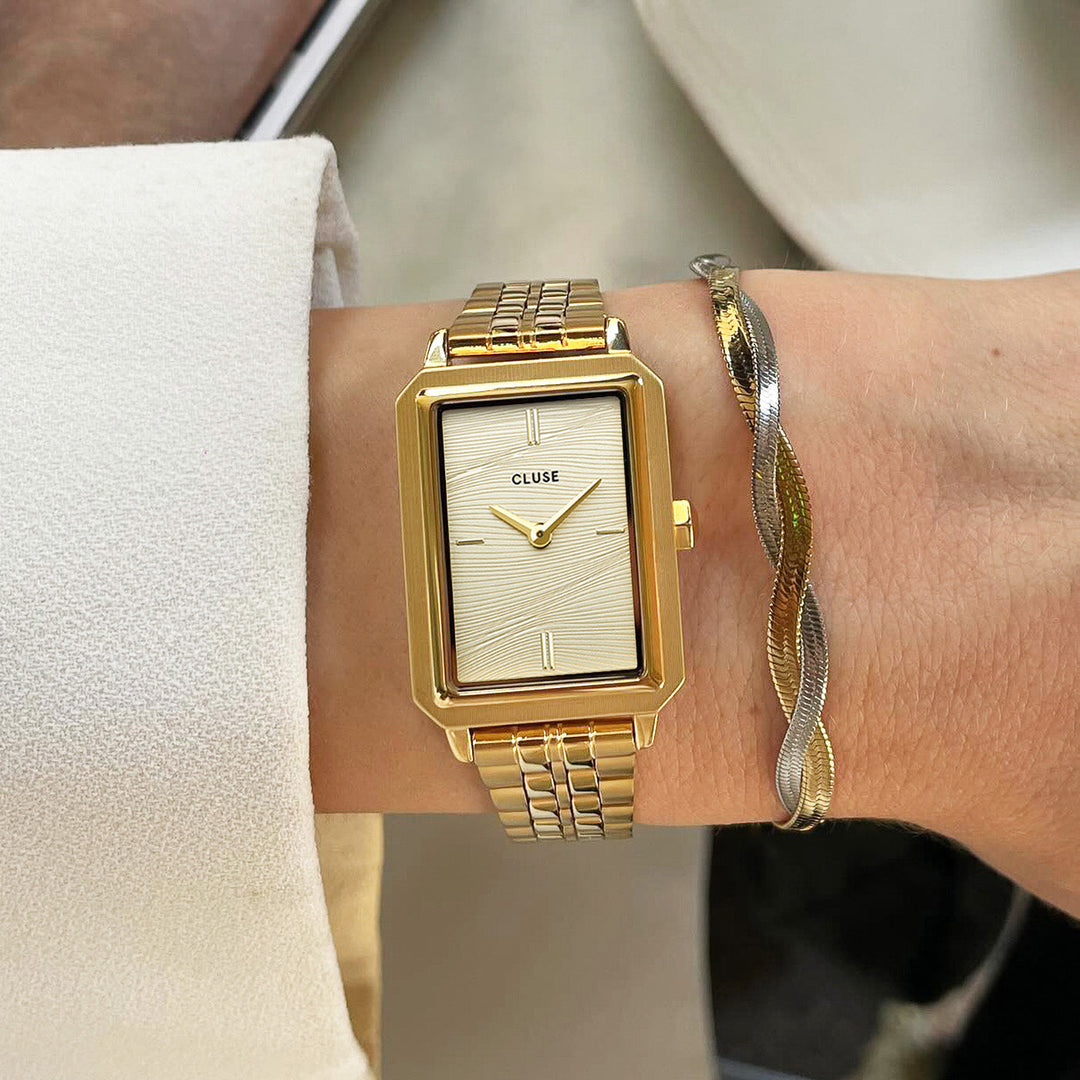 フリュエットウォッチ スチール、サンドテクスチャー フルゴールドカラー